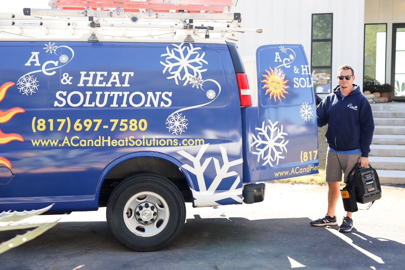 AC & Heat Solutions truck getting loaded up for a heat pump repair job in Southlake