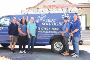 AC & Heat Solutions’s wrapped truck helps us provide top-notch Heat Pump Installation in Keller